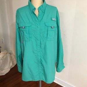 Women’s long sleeve teal Columbia PFG shirt.